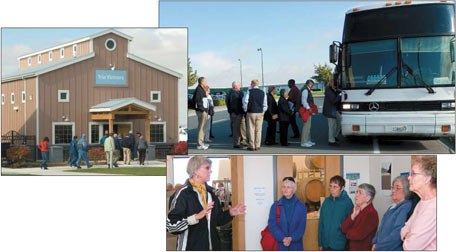 PHOTOS: Above right - visitors get “on board” for their recent tour of Port of Walla Walla facilities, which included a visit to Trio Vintners, one of three companies leasing Port-owned buildings in the Airport Industrial Park for start-up wineries. At lower right, wine maker Denise Slattery, explains winery processes. Photos by Donna Lasater